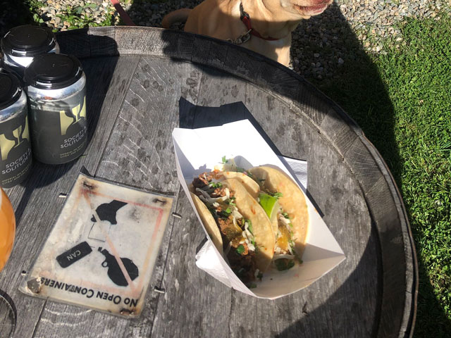 Enjoying beers and tacos at Hill Farmstead Brewery